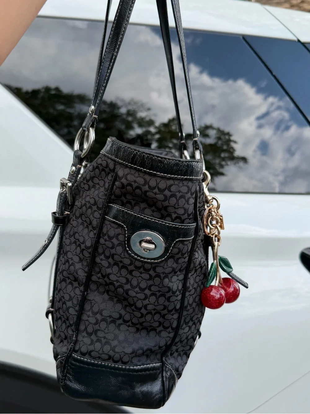 Coach Black Signature Canvas Shoulder Tote with Red Cherry Charm